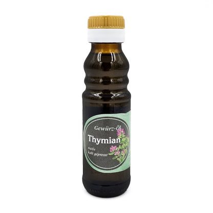 Thymian Gewürzöl nativ kaltgepresst, 100 ml in brauner Glasflasche mit hellgrünem Etikett der Ölmühle Garting auf weißem Hintergrund