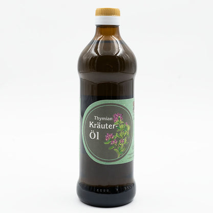 Thymian Kräuteröl nativ kaltgepresst, 500 ml in brauner Glasflasche mit hellgrünem Etikett der Ölmühle Garting auf weißem Hintergrund 