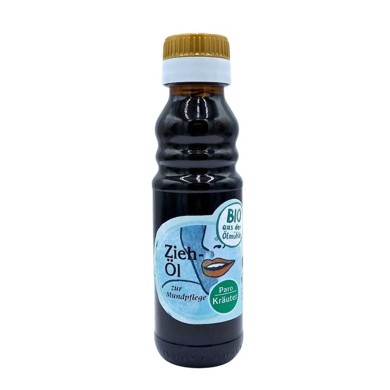 Bio Ziehöl Kräuter zur Mundpflege, 100 ml in brauner Glasflasche der Ölmühle Garting mit blauem Etikett auf weißem Hintergrund