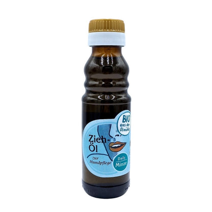 Bio Ziehöl Minze zur Mundpflege, 100 ml in brauner Glasflasche der Ölmühle Garting mit blauem Etikett auf weißem Hintergrund 